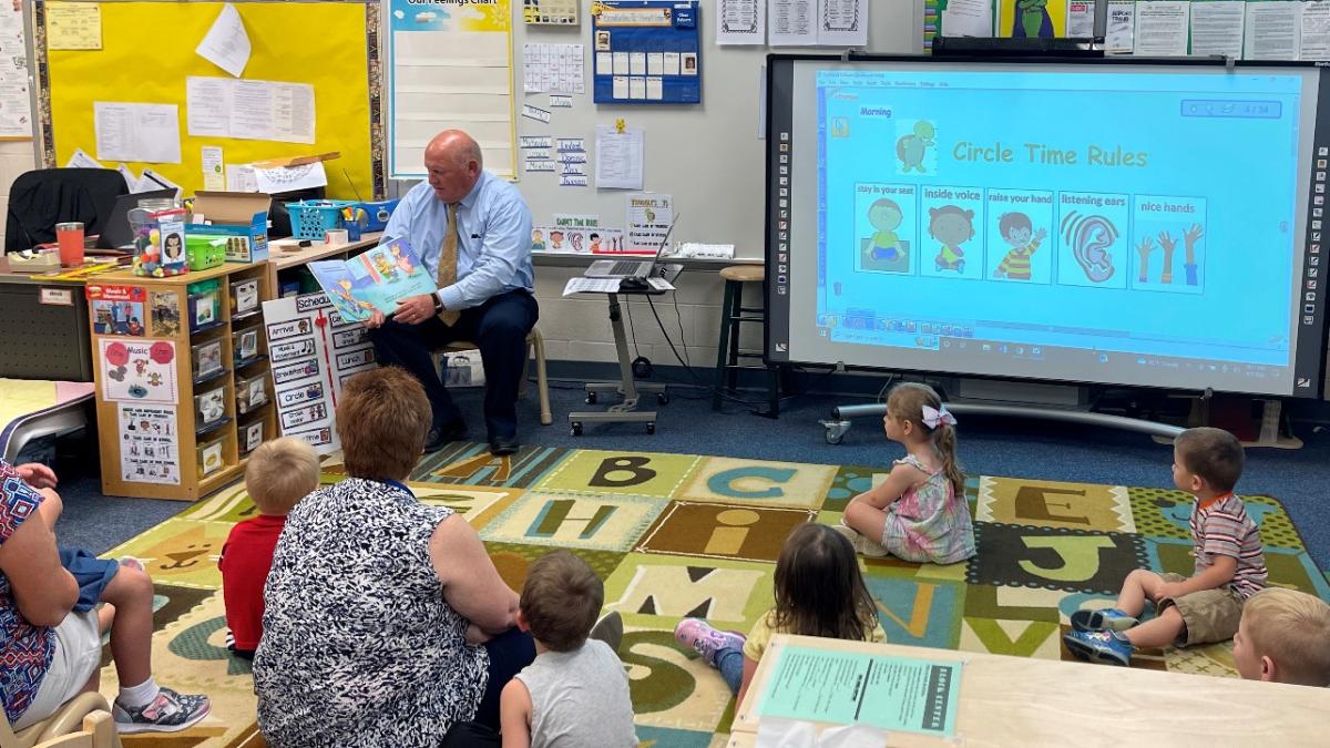 GT reads to preschool students at Pine Creek Elementary