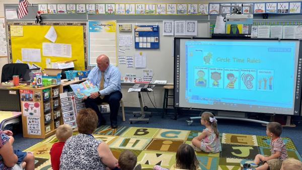 GT reads to preschool students at Pine Creek Elementary