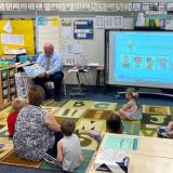 GT reads to preschool students at Pine Creek Elementary 